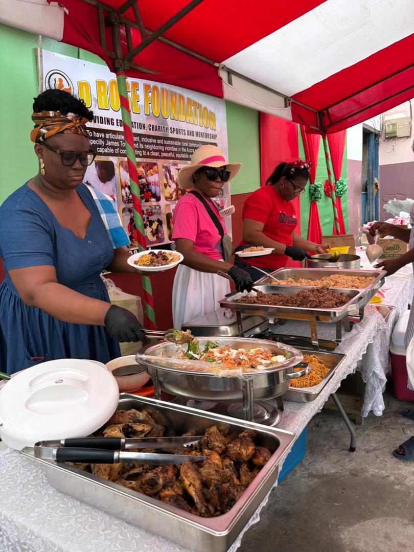 Volunteers serving hot meals to the community