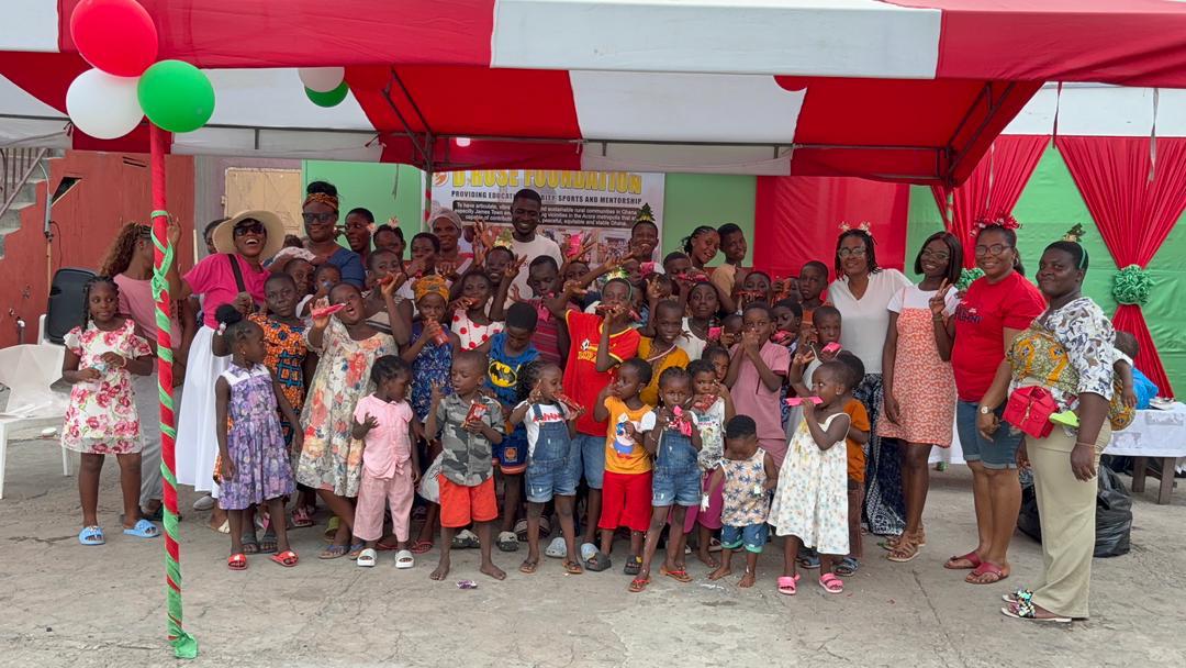 Children and volunteers gathered together at the outreach event