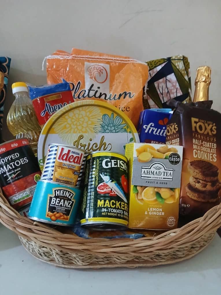 A care package of household and food essentials for families